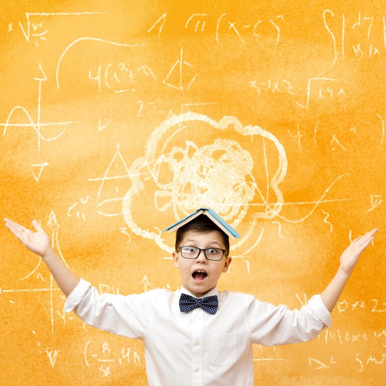boy with a yellow background, holding his hands up